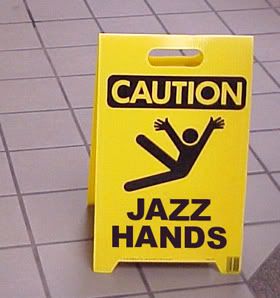 http://i209.photobucket.com/albums/bb256/mmahollan2007/funny-sign-jazz-hands.jpg