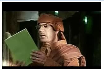 Gadhafi reading from his Green Book